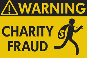 Warning Charity Fraud sign